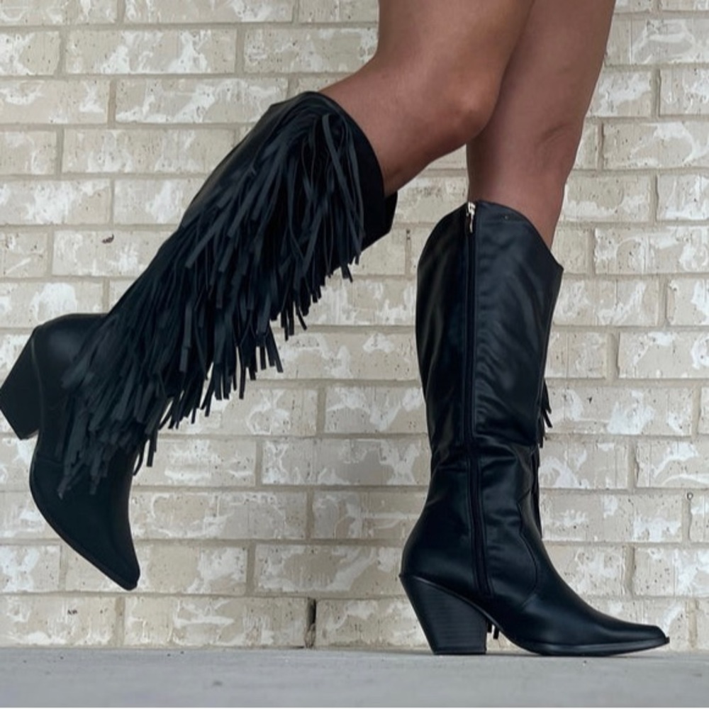 Knee high black fringe boots